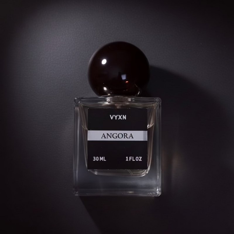 perfume bottle labeled ANGORA black background