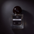 Perfume bottle AEGEAN on black studio background