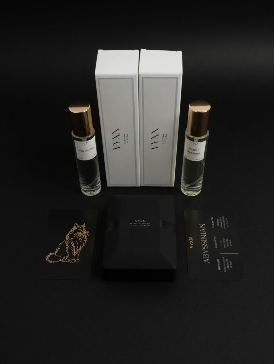Two perfume bottles, a box, and a brooch on a black background with 'LYNX' branding.